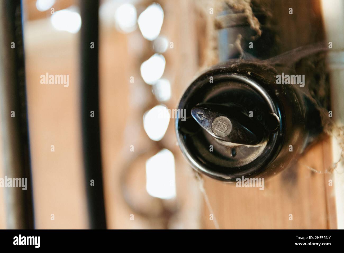Light switch, retro, black bakelite, workshop Stock Photo