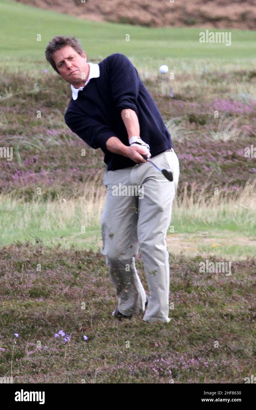Actor Hugh Grant plays Prestwick Old Course, Ayrshire, Scotland on a visit to Scotland, 27 July 2010 Stock Photo