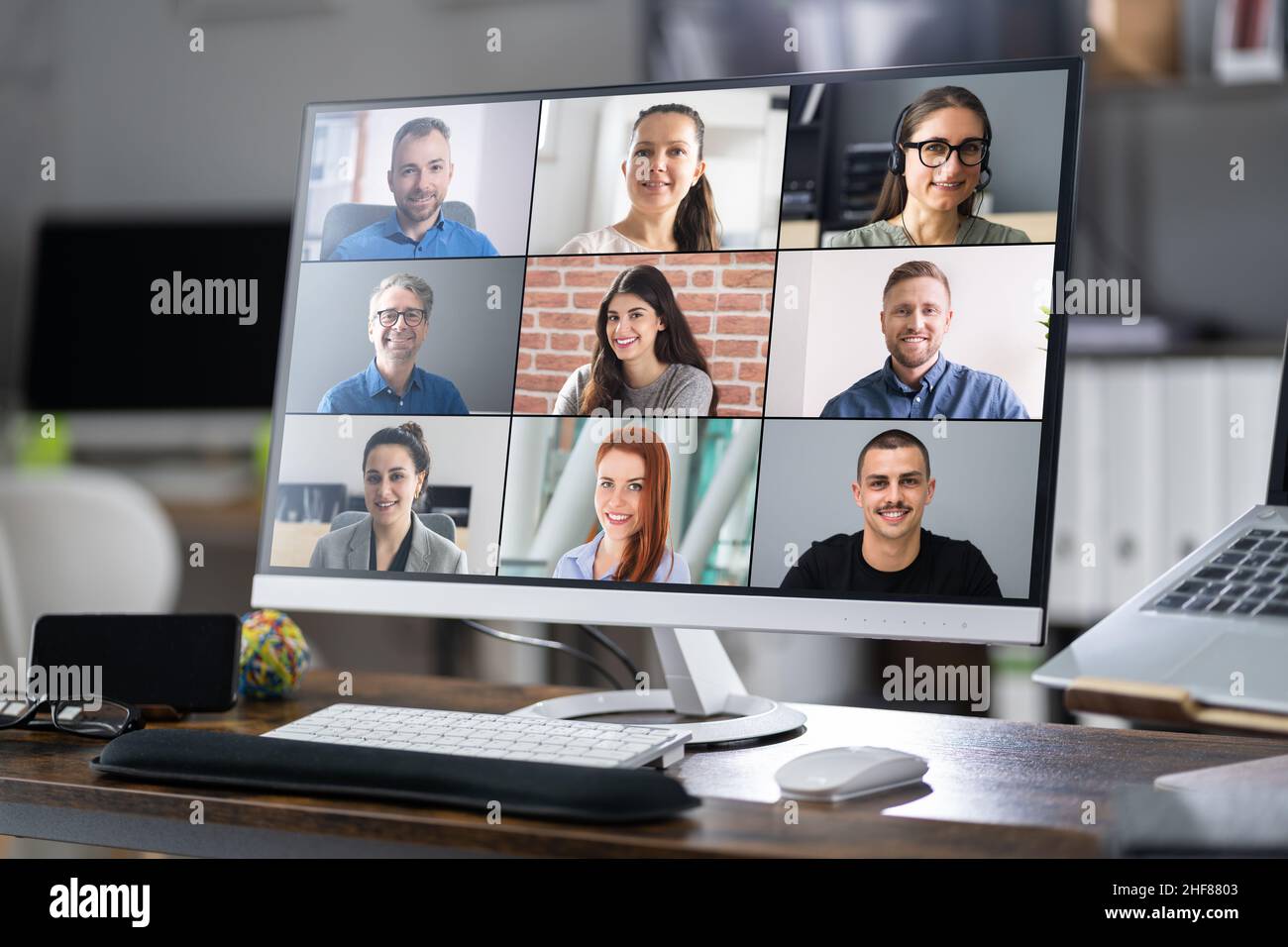 Online Video Conference Webinar Call With Team Stock Photo