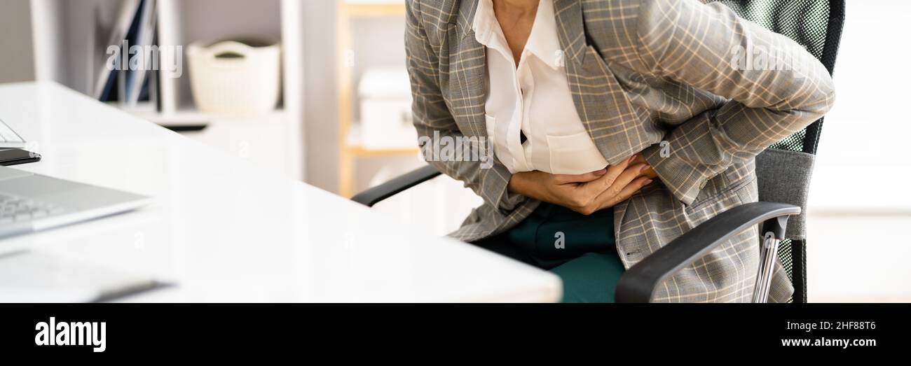 Incontinence, Constipation, Menopause Or PMS Stomach Pain Stock Photo