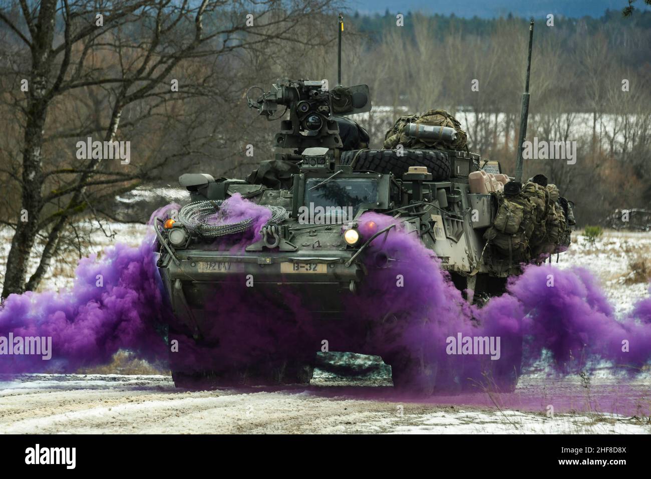 Grafenwoehr, BY, Germany. 11th Jan, 2022. U.S. Soldiers, assigned to Bull Troop, 1st Squadron, 2nd Cavalry Regiment, maneuver a Stryker armored vehicle during a situational training exercise at the 7th Army Training Command's Grafenwoehr Training Area, Germany, Jan. 11, 2022. Credit: Markus Rauchenberger/U.S. Army/ZUMA Press Wire Service/ZUMAPRESS.com/Alamy Live News Stock Photo