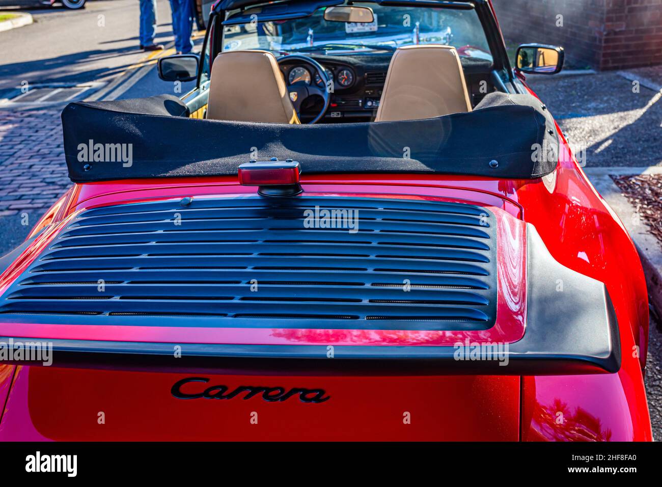Fernandina Beach, FL - October 18, 2014: Wide angle low perspective rear view of a 1985 Porsche 911 Carrera Cabriolet at a classic car show in Fernand Stock Photo