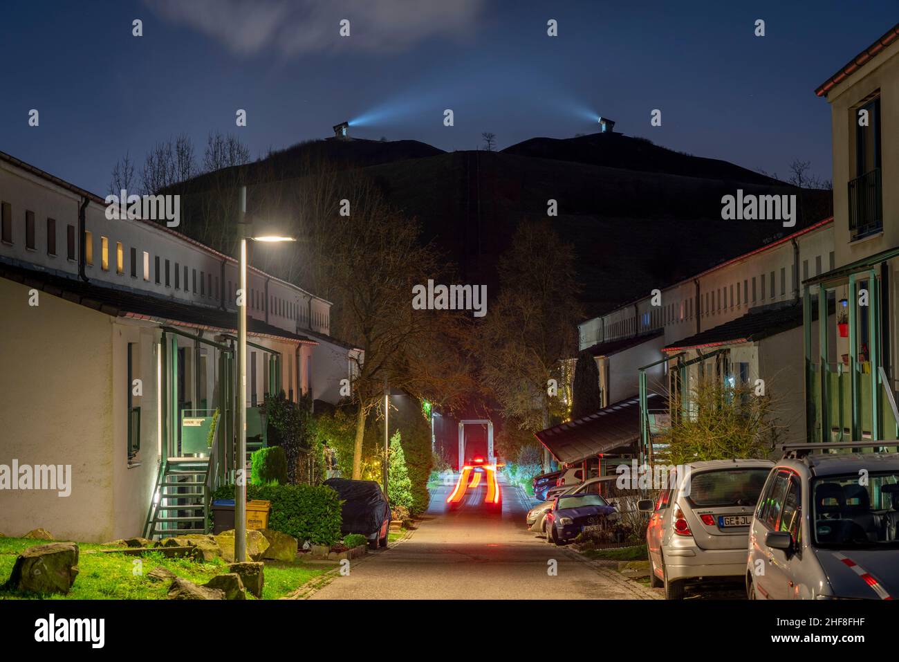 Rungenberg slag heap in the Buer district, light installation night sign, SchŸngelberg housing estate, Zum Rungenberg street, Gelsenkirchen, NRW, Germ Stock Photo