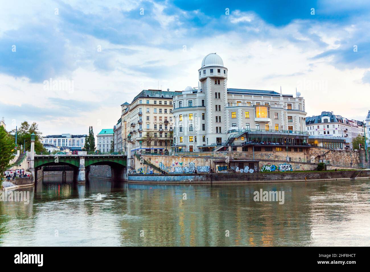 old historic building with observatory at the riverside of the danube ...