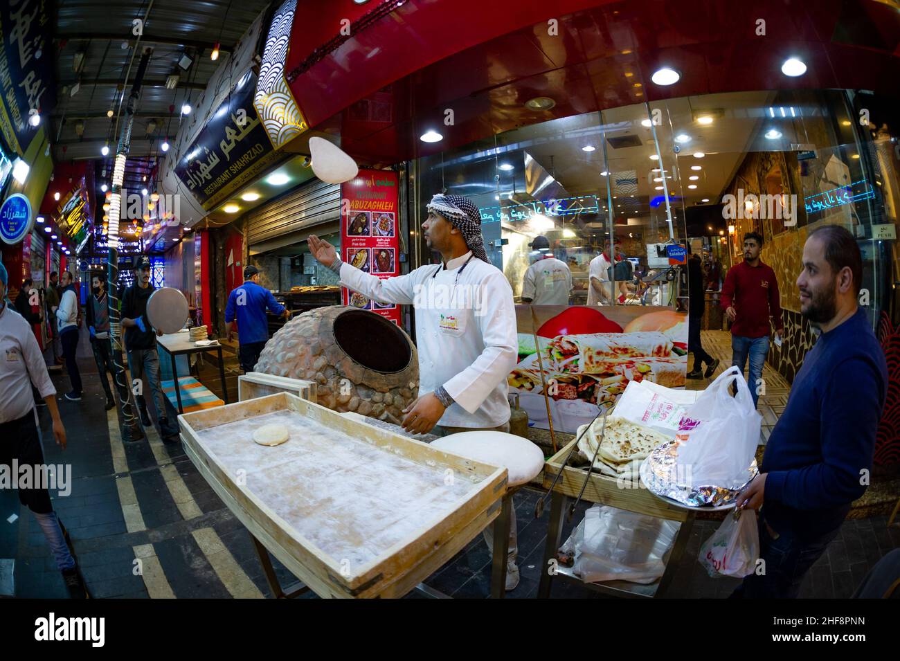 Baker making bread in Amman Jordan 25 December 2021 Stock Photo Alamy