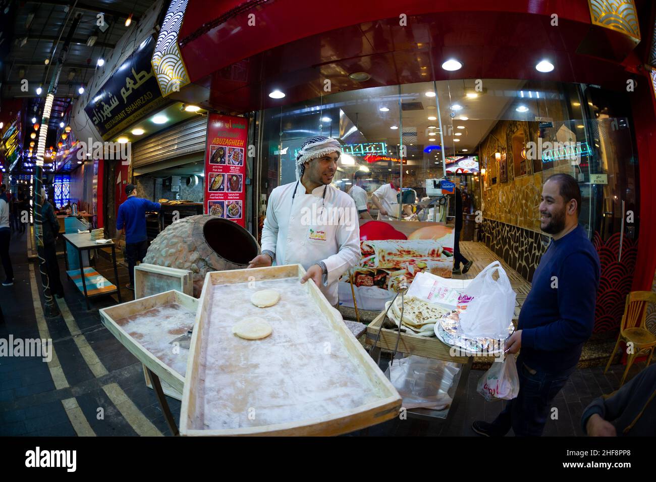 Baker making bread in Amman Jordan 25 December 2021 Stock Photo Alamy