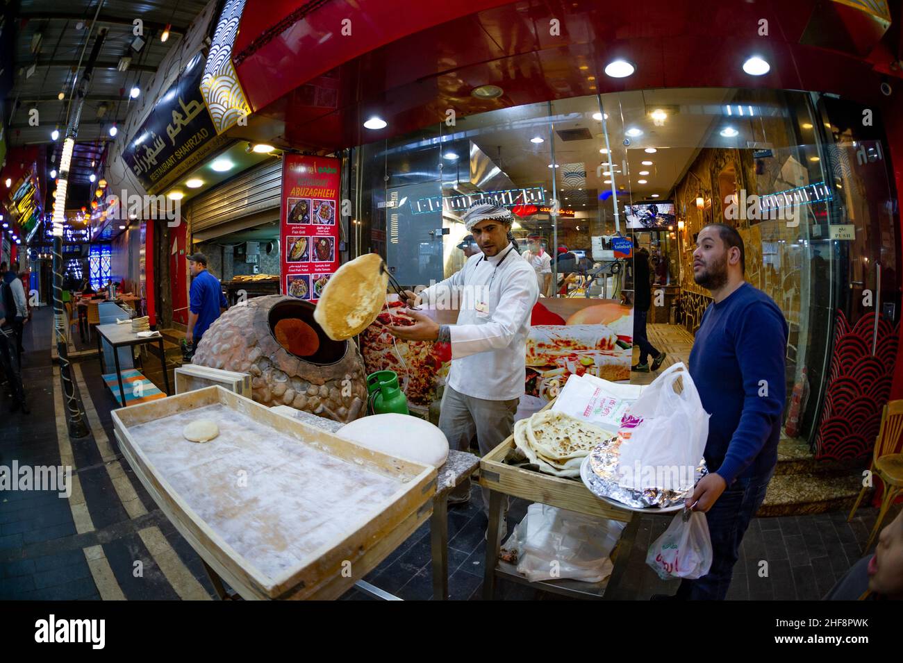 Baker making bread in Amman Jordan 25 December 2021 Stock Photo Alamy