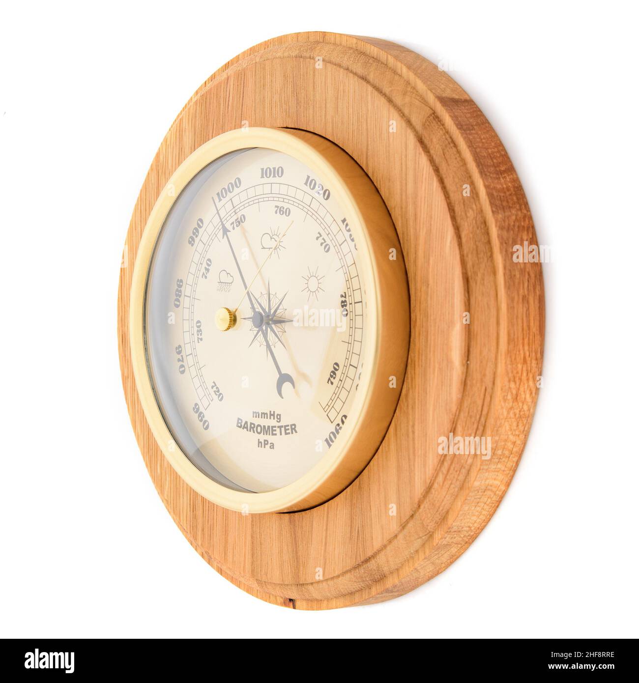 Vintage wooden clock with barometer and Old marine style thermometer on a white background. Wall
