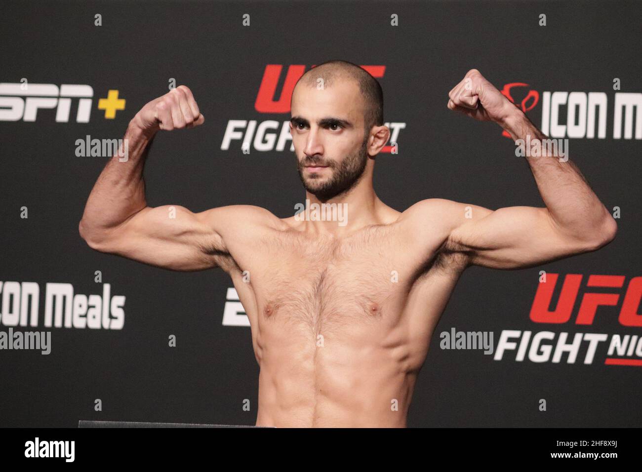 Las Vegas, USA. 14th Jan, 2022. LAS VEGAS, NV - JANUARY 14: Giga Chikadze poses on the scale during the UFC Vegas 46: Kattar v Chikadze Weigh in at UFC Apex on January 14, 2022 in Las Vegas, Nevada, United States. (Photo by Diego Ribas/PxImages) Credit: Px Images/Alamy Live News Stock Photo