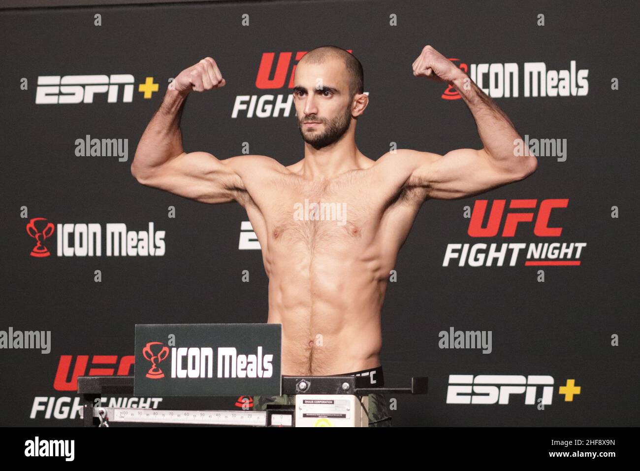 Las Vegas, USA. 14th Jan, 2022. LAS VEGAS, NV - JANUARY 14: Giga Chikadze poses on the scale during the UFC Vegas 46: Kattar v Chikadze Weigh in at UFC Apex on January 14, 2022 in Las Vegas, Nevada, United States. (Photo by Diego Ribas/PxImages) Credit: Px Images/Alamy Live News Stock Photo