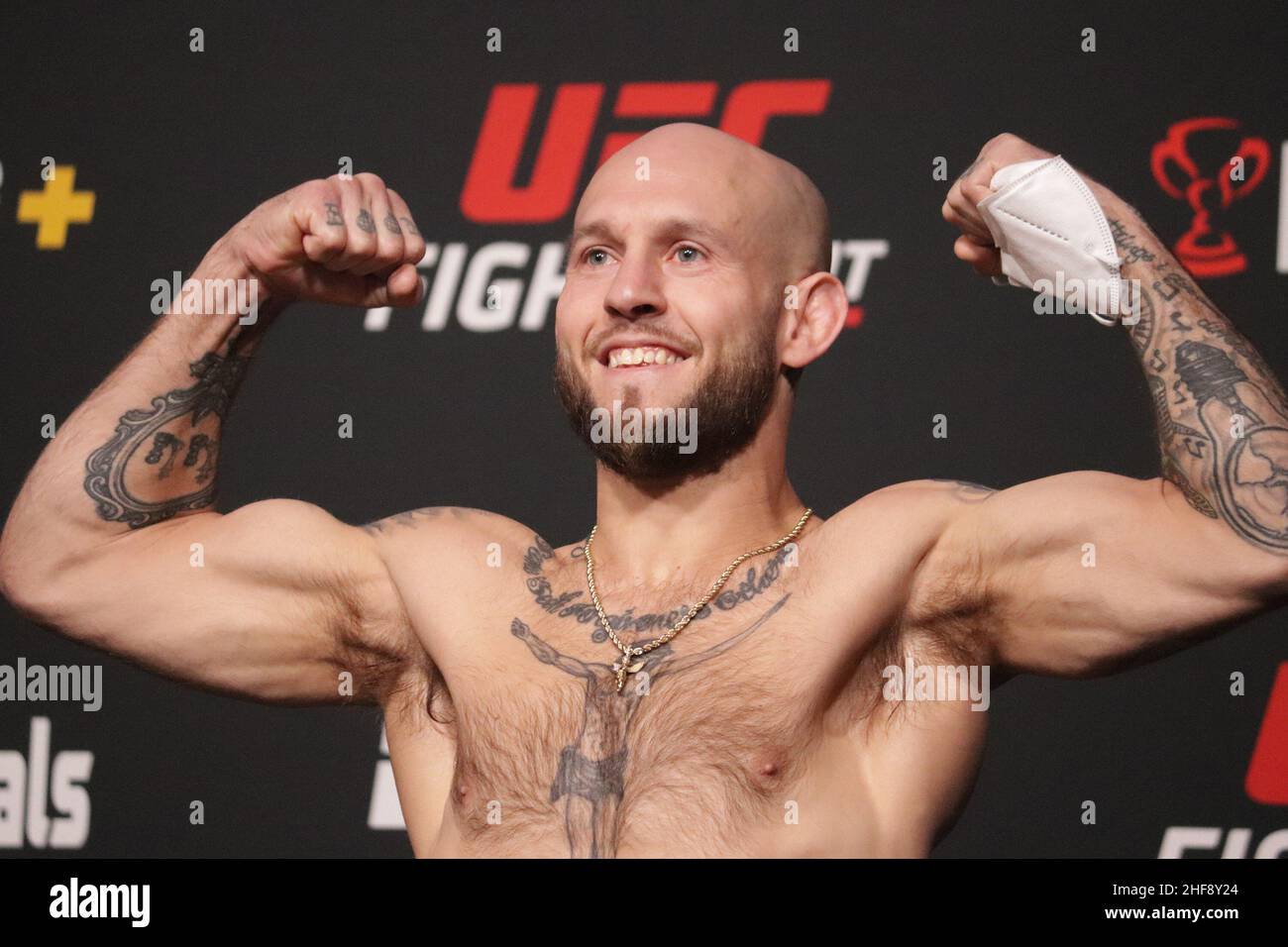 Las Vegas, USA. 14th Jan, 2022. LAS VEGAS, NV - JANUARY 14: Brian Kelleher poses on the scale during the UFC Vegas 46: Kattar v Chikadze Weigh in at UFC Apex on January 14, 2022 in Las Vegas, Nevada, United States. (Photo by Diego Ribas/PxImages) Credit: Px Images/Alamy Live News Stock Photo