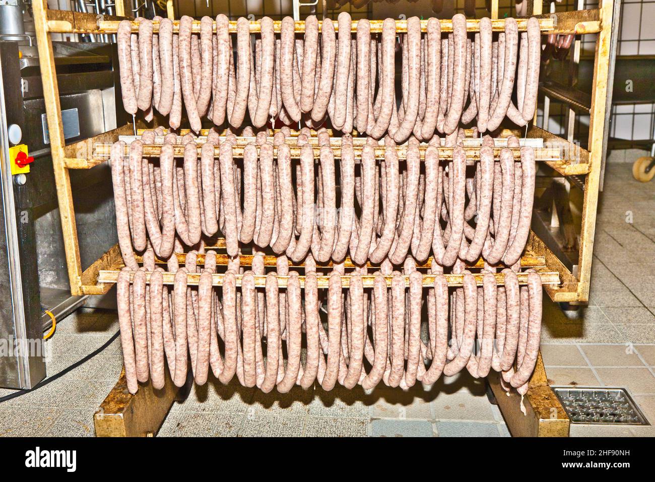 sausages are cooking at the butcher Stock Photo