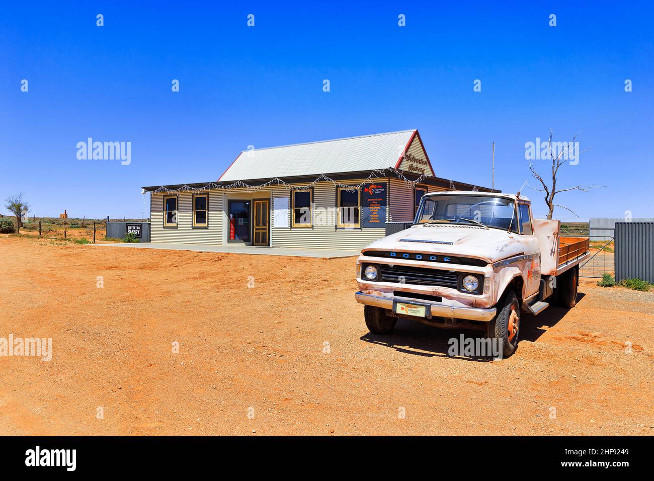 Silverton, Australia - 27 Dec 2021: Historic Silverton bakery store with old truck car in ghost town of Australian outback. Stock Photo