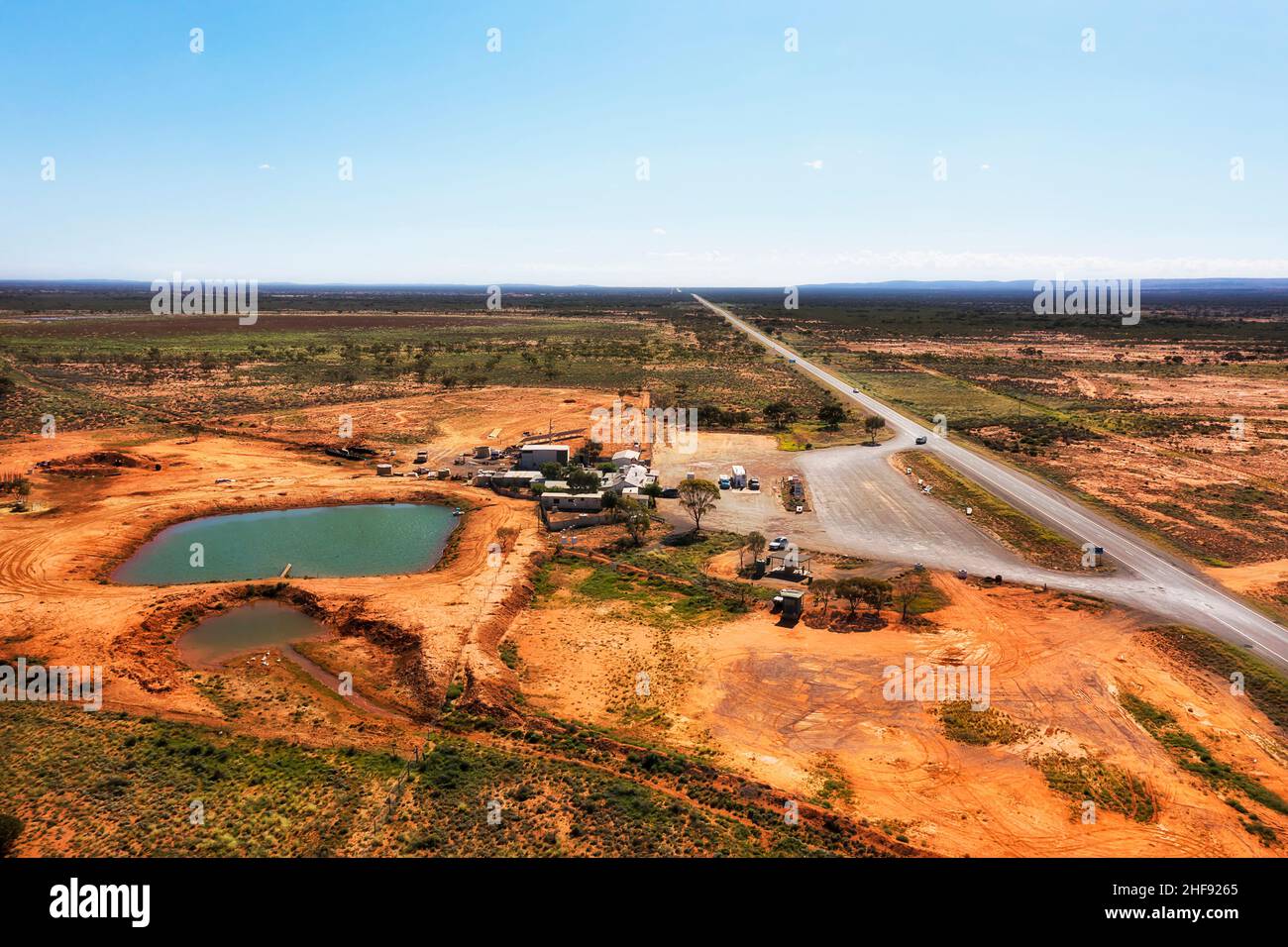 Roadhouse and rest area stop over with fuel station near Broken Hill on Barrier highway - aerial landscape. Stock Photo