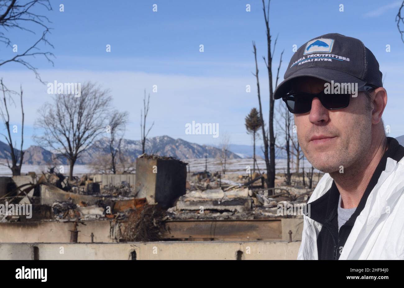 Brent Peckham at the site of his burned home in Superior CO. Peckham's home was destroyed in the Marshall Fire, Dec. 20, 2021. Stock Photo