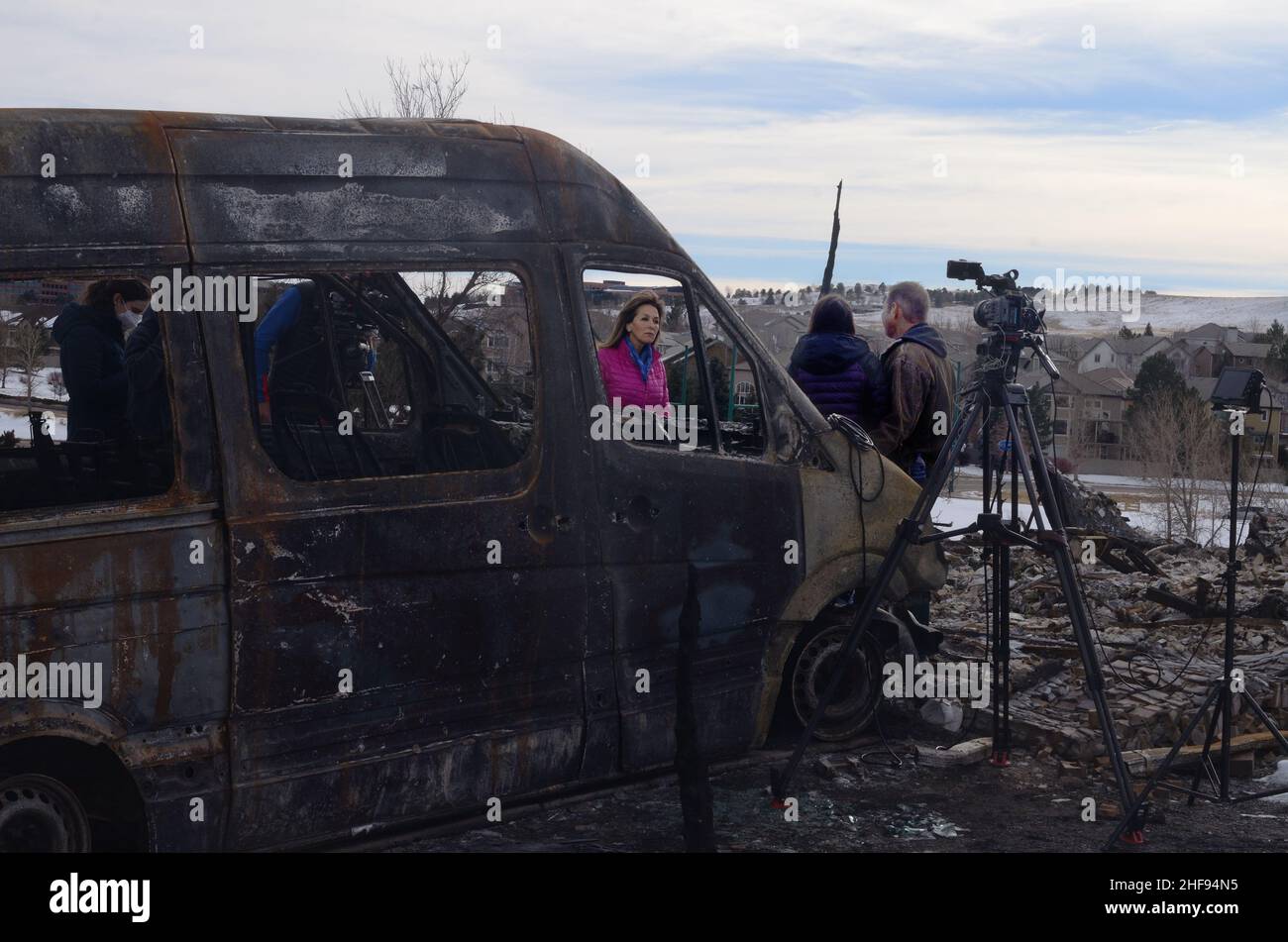 Marshall Fire victims Nathan and Cheryl Ruff are interviewed by CBS Correspondent Janet Shamlian at their destroyed home in Superior CO. Stock Photo