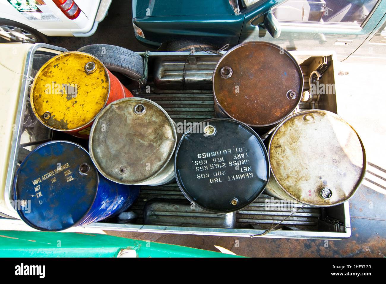 empty barrels on a loading platform of a car Stock Photo