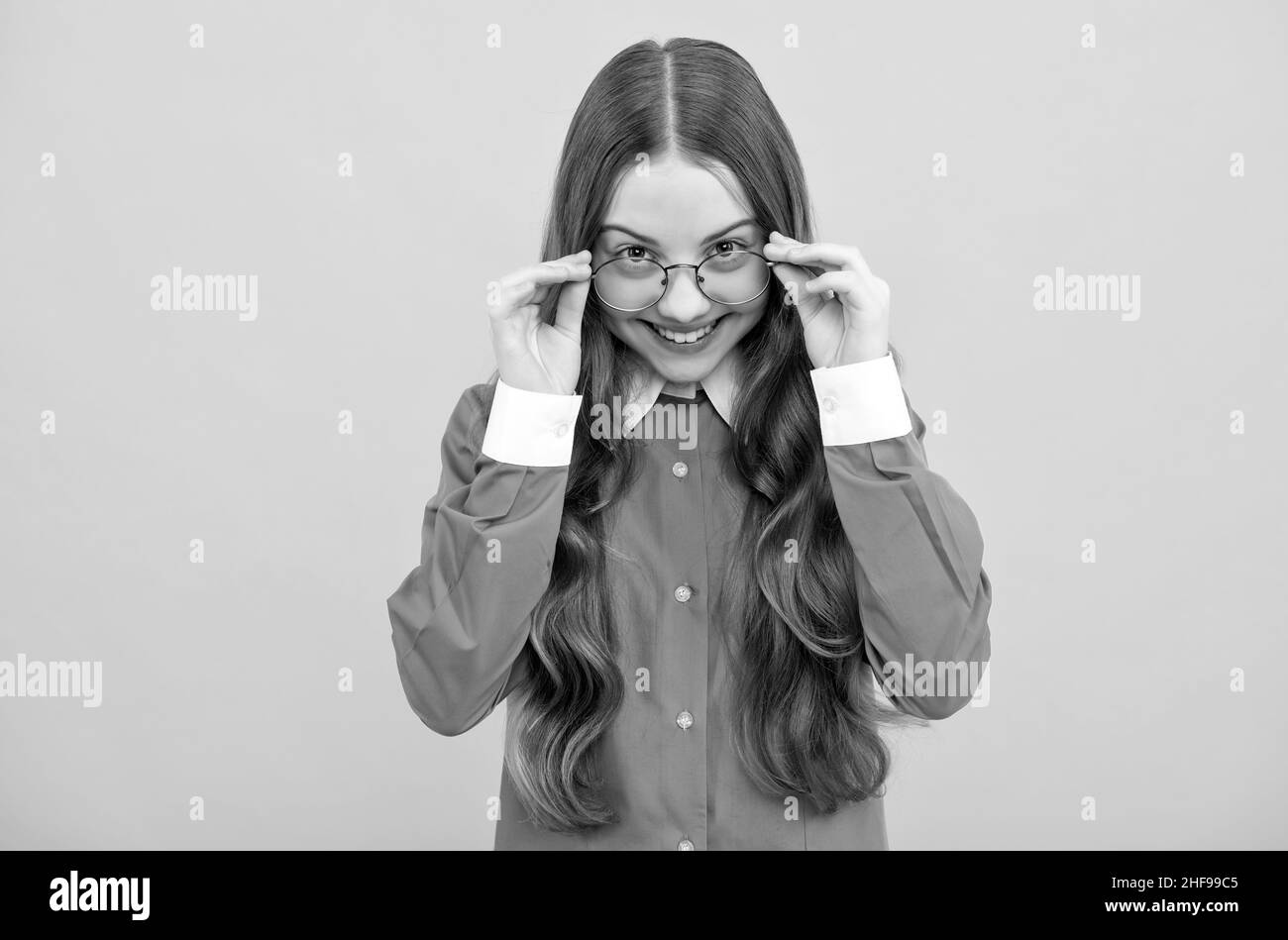 I can see you. Happy girl child look through eyeglasses. Vision acuity. Eyesight. Vision correction Stock Photo