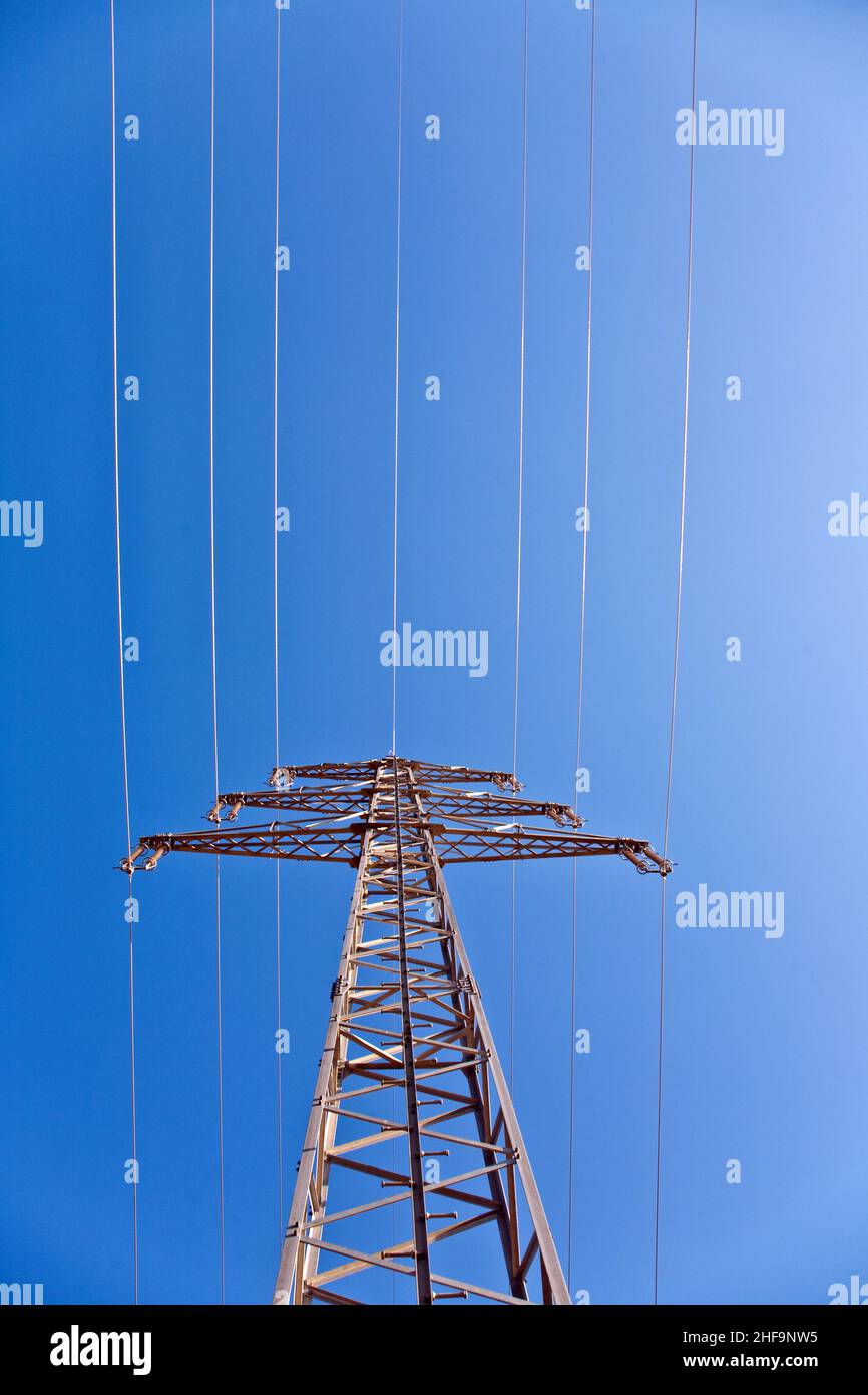 electricity high voltage tower with blue sky Stock Photo - Alamy