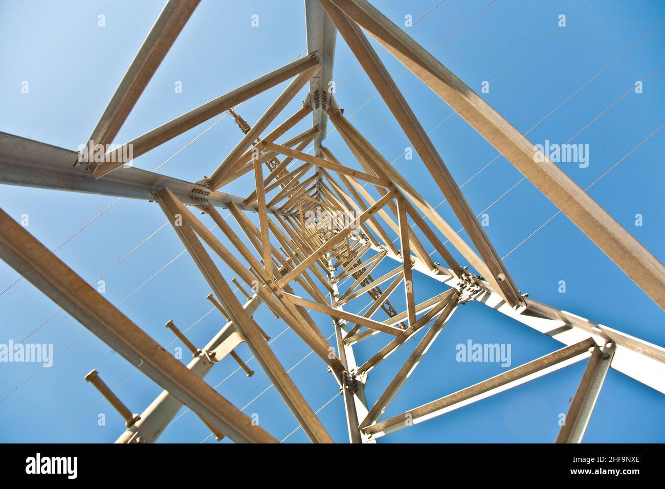 electricity high voltage tower with blue sky Stock Photo - Alamy