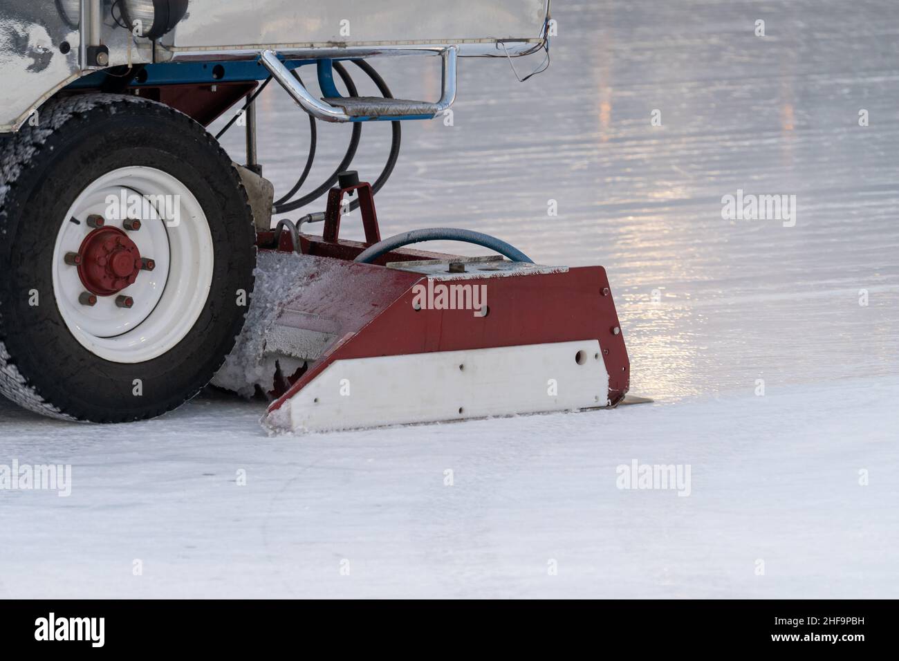 Polished ice maintenance machine ice preparation at rink between