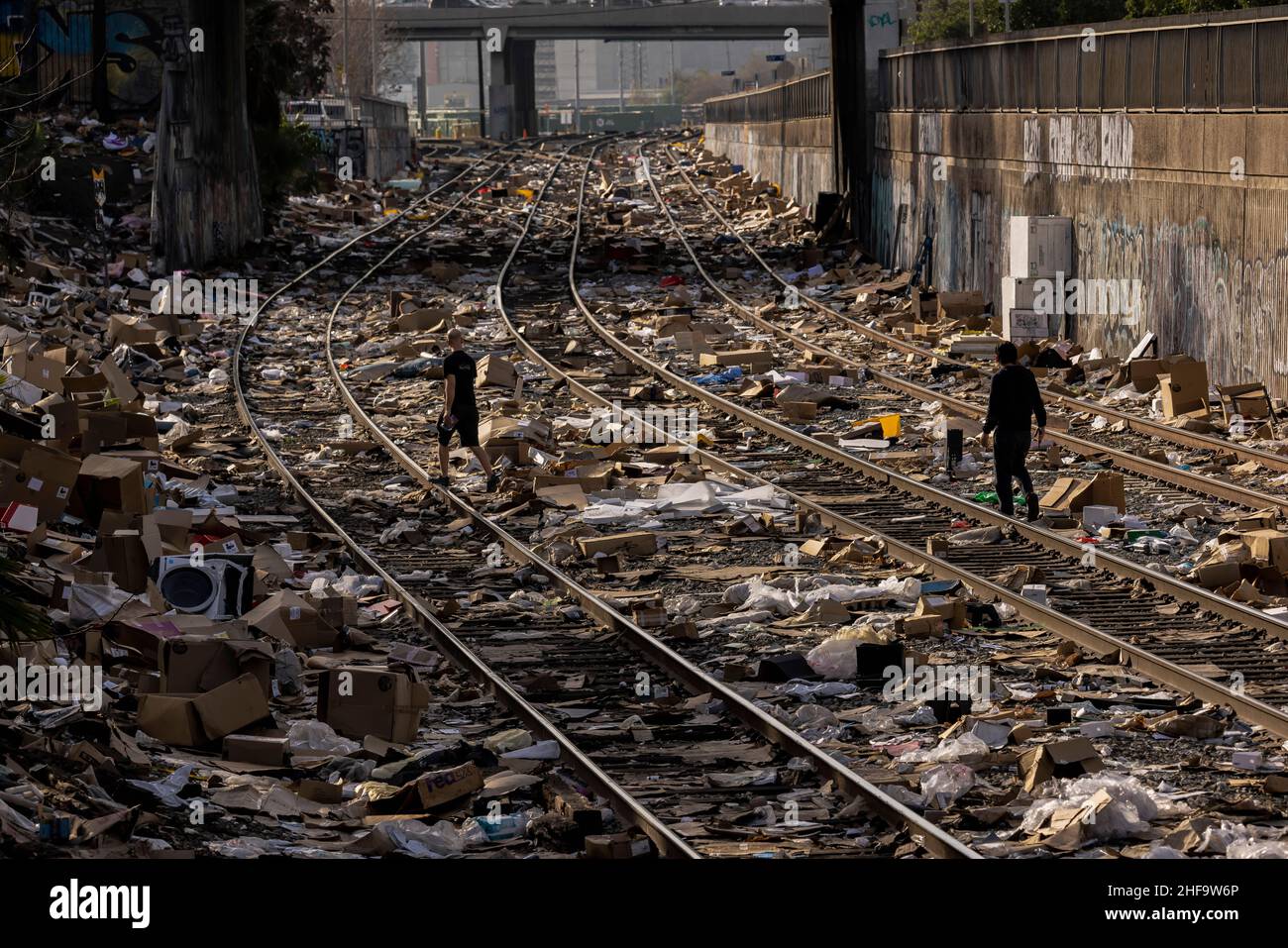 Thousands of stolen UPS packages line the Union Pacific rail lines in East Los Angeles for at