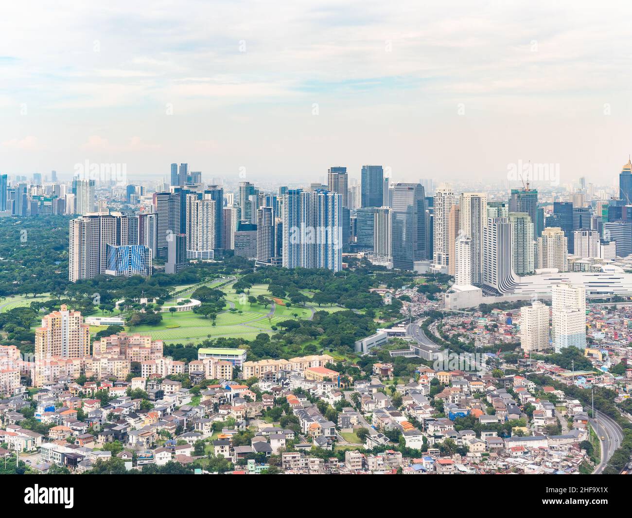 Aerial photo of Bonifacio Global City in Taguig, Metro Manila, the Philippines with its glitzy shopping areas and fashionable high rise buildings. In Stock Photo