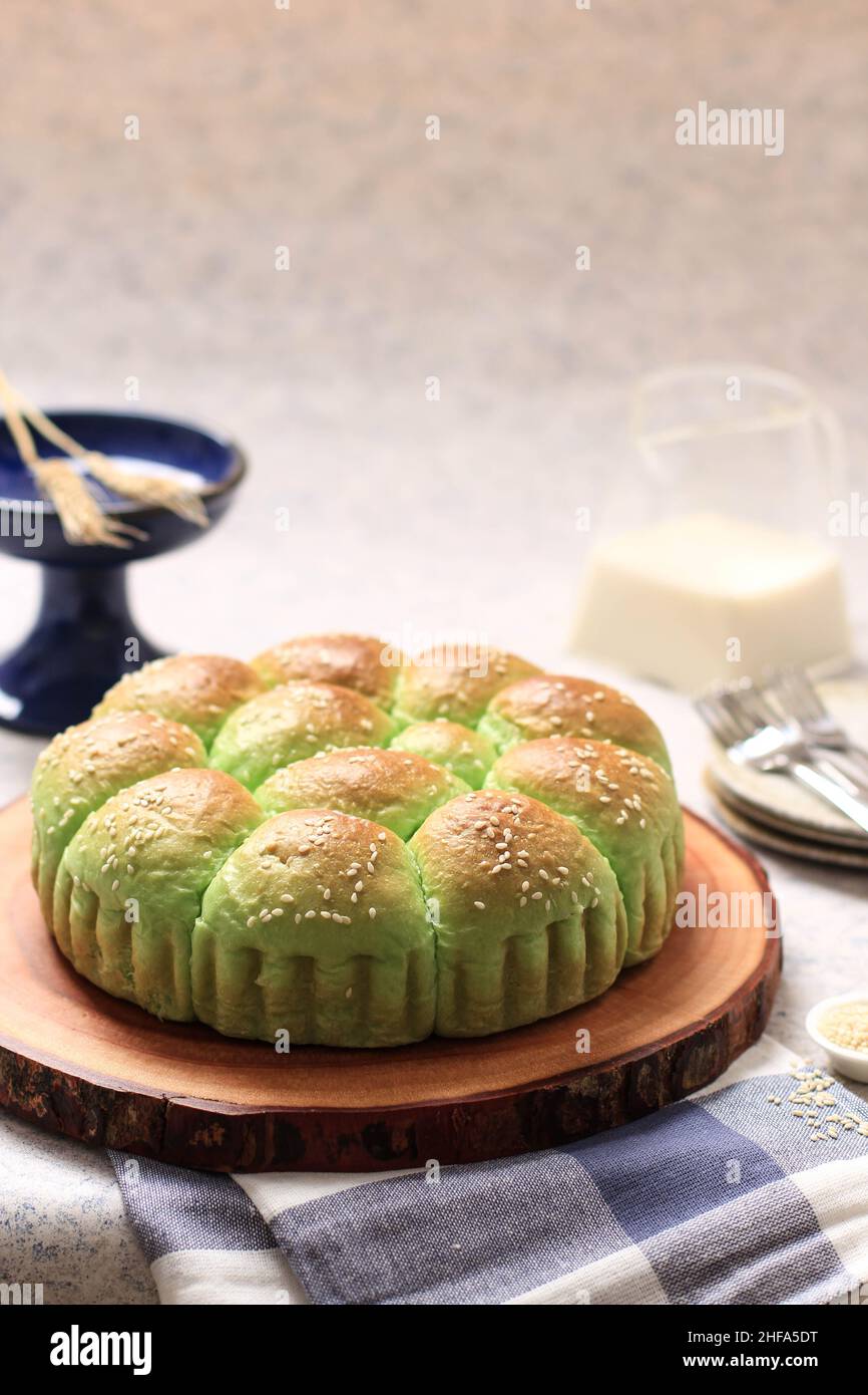 Roti Sobek Pandan or Pandan Pull Out Bread on Rustic Wooden Log Board ...