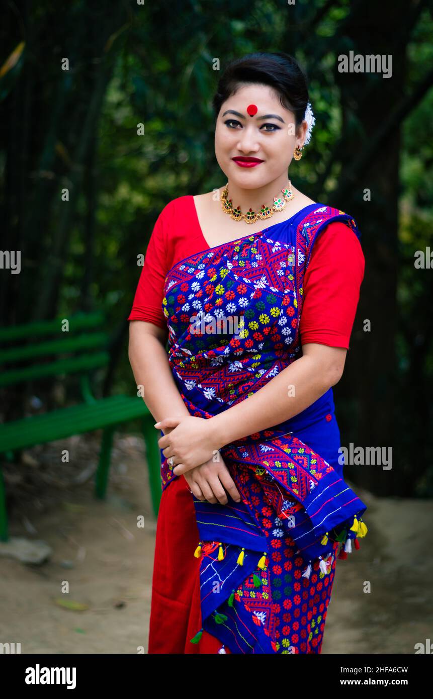 girl close up portrait isolated dressed in traditional wearing on festival with blurred background image is taken on the occasion of bihu at assam ind Stock Photo