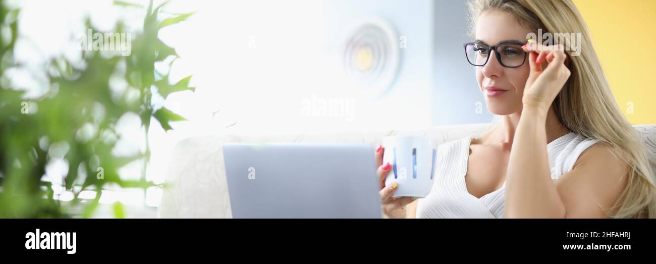 Happy white blonde woman typing hi-res stock photography and images - Alamy