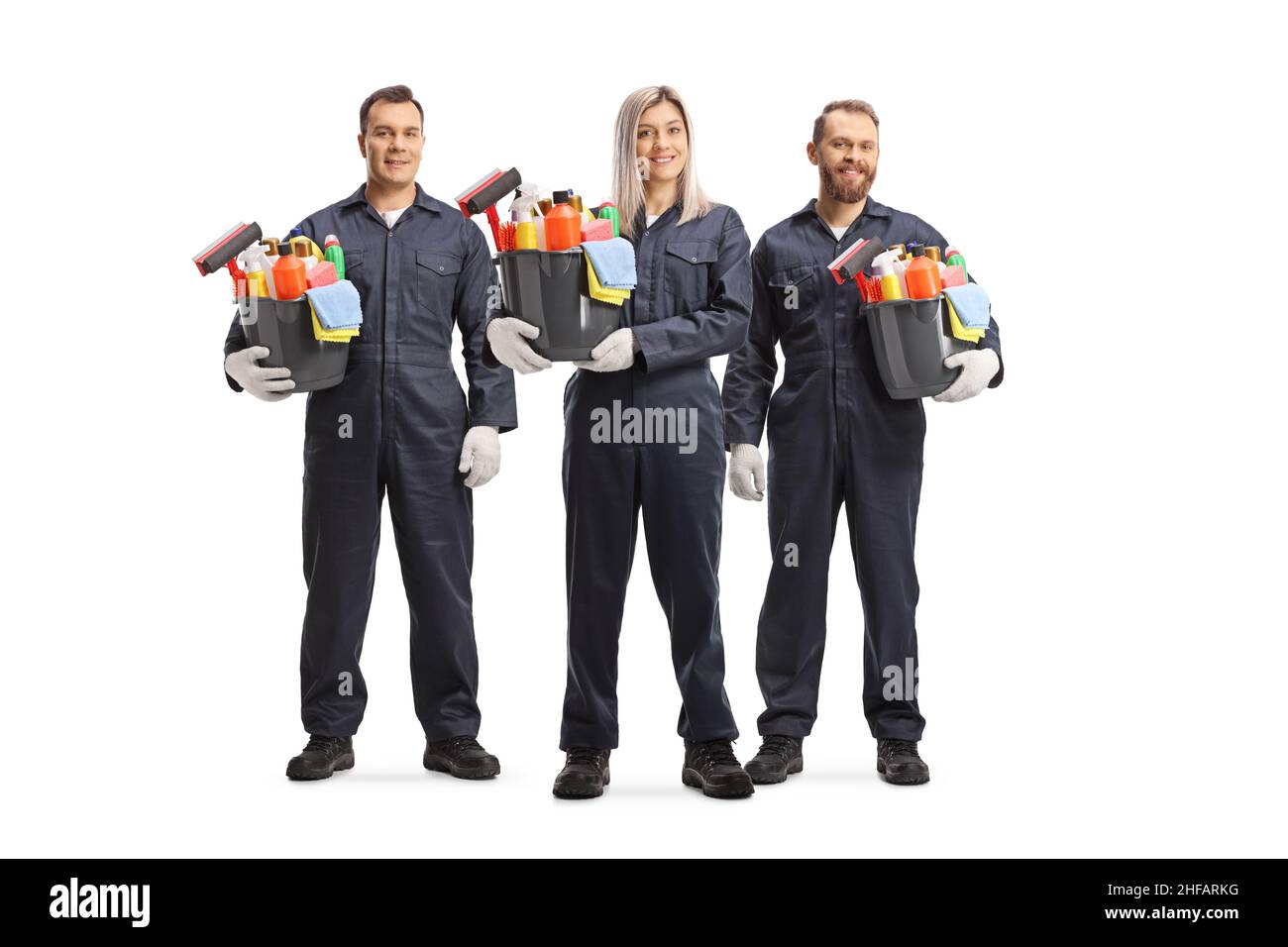 Female and male cleaners in uniforms holding buckets with cleaning