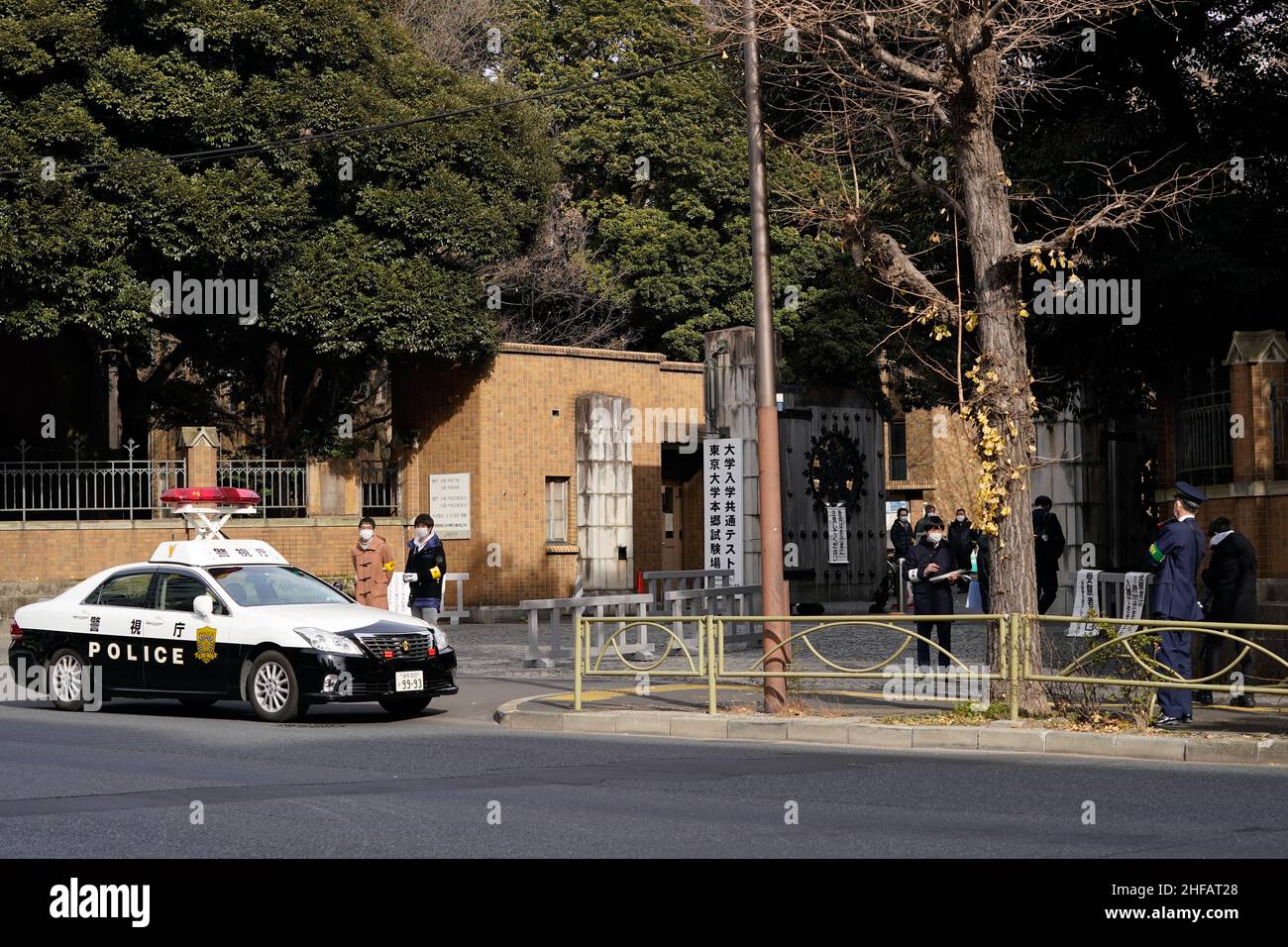 Tokyo, Japan - Police officers and security are seen in front of University of Tokyo where a 17-year-old man attacked three individuals with a knife during the nationwide unified university entrance exams in Tokyo, Japan on January 15, 2022. Credit: AFLO/Alamy Live News Stock Photo