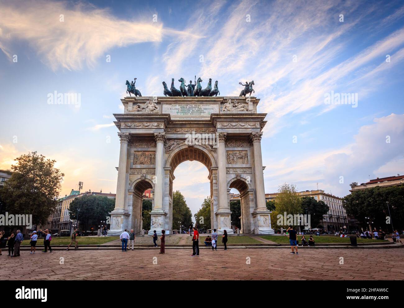 Porta Sempione, an Arch of Peace in Milan. The gate from the 19th century is called Arco della Pace, though its origins date back to the Roman wall. Stock Photo