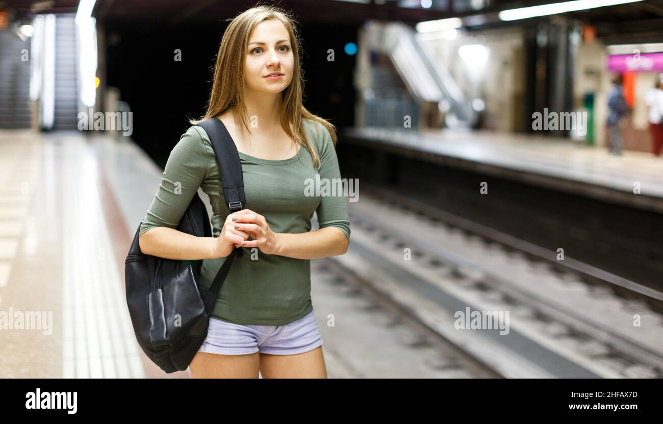 Female traveling waiting train hi-res stock photography and images - Alamy