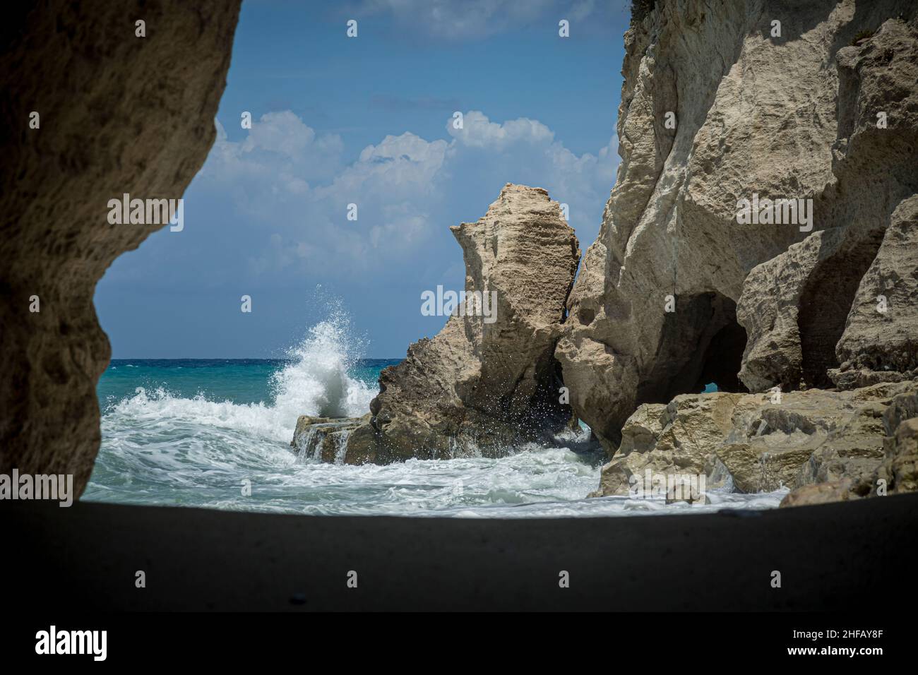 High Rocks Italy High wave breaking on the rocks of the coastline in Italy Stock Photo ...