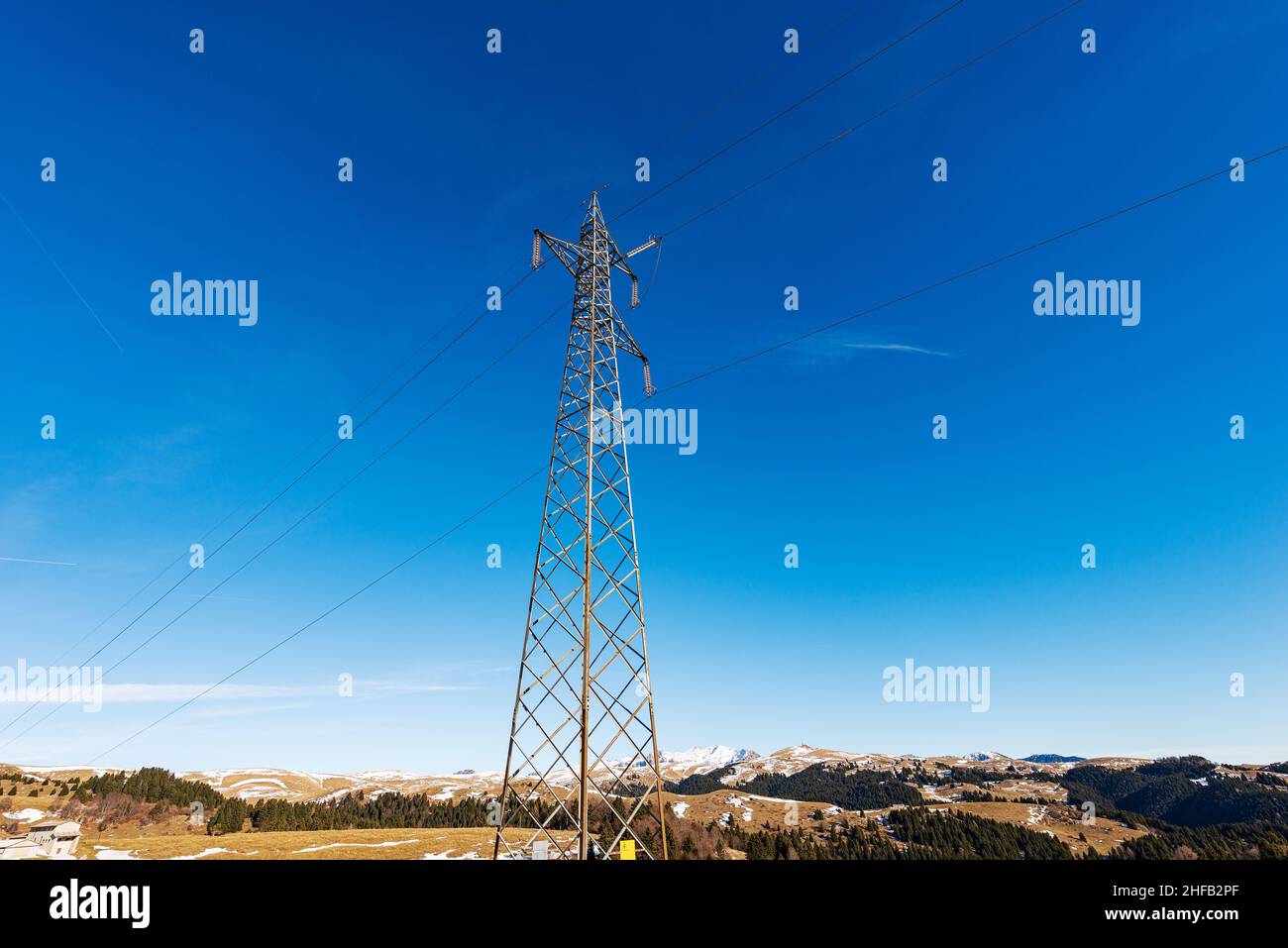 Photography of a High voltage tower, power line with electric cables