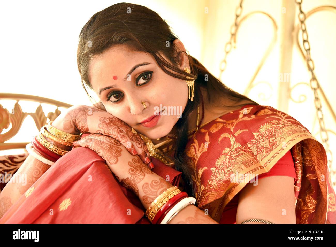 Portrait of a beautiful Indian Bengali woman dressed in ethnic saree