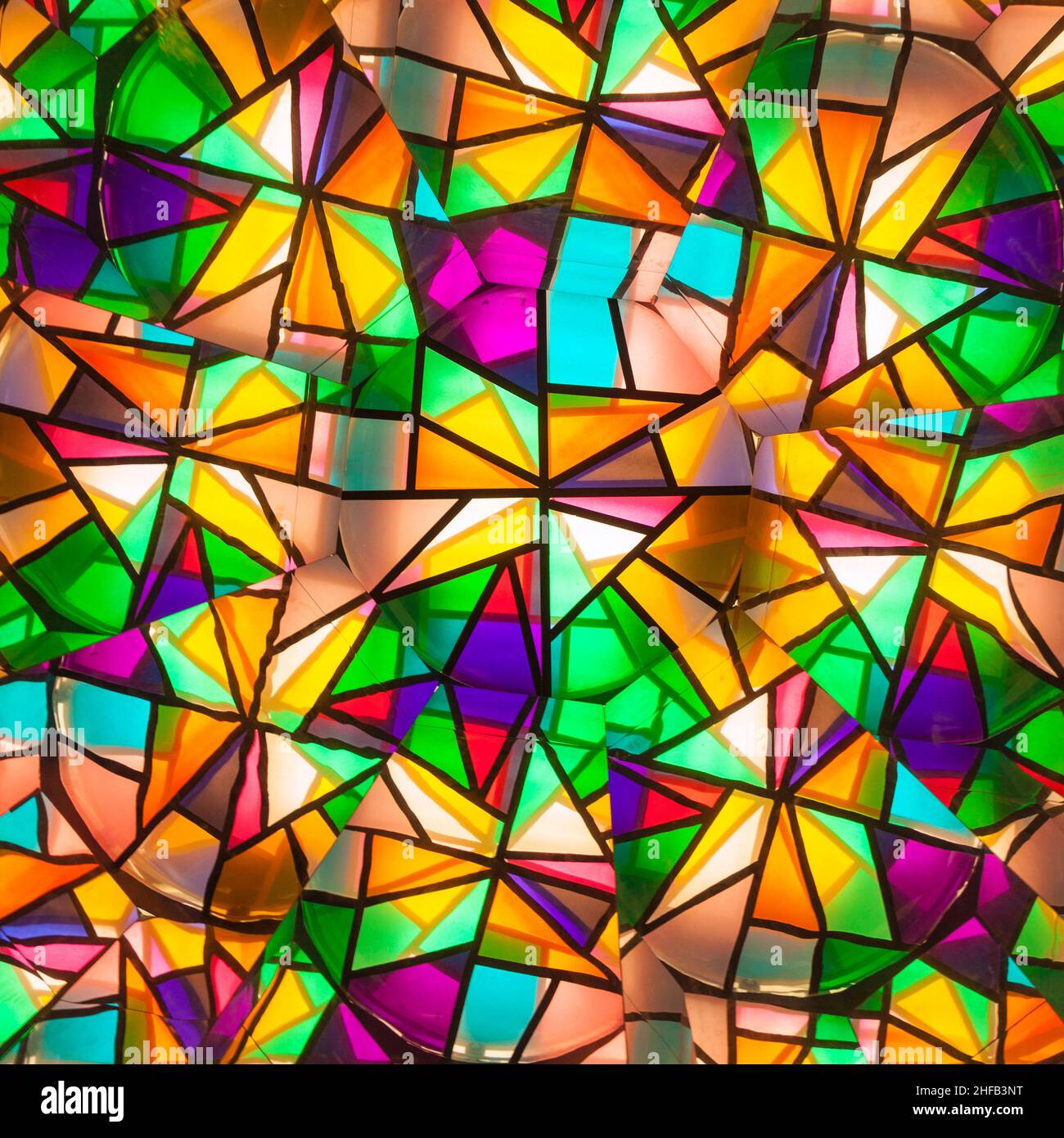 Beautiful colored glass windows with asymetric pieces Stock Photo by  ©Hackman 5617799
