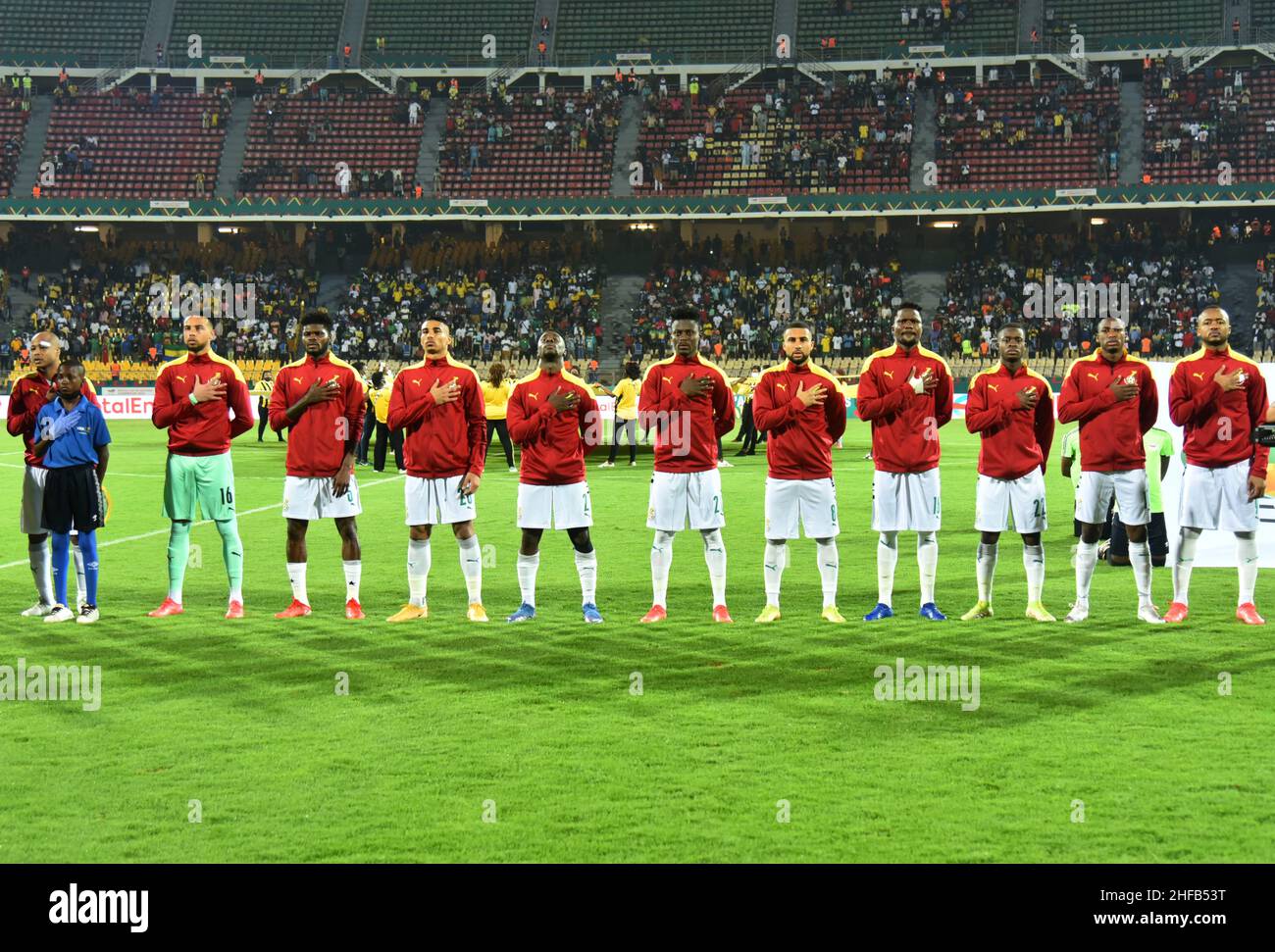 Yaounde, Cameroon. 14th Jan, 2022. Players of Ghana react during the national anthem ceremony before the Group C match between Ghana and Gabon at the Africa Cup of Nations, in Yaounde, Cameroon, Jan. 14, 2022. Credit: Kepseu/Xinhua/Alamy Live News Stock Photo