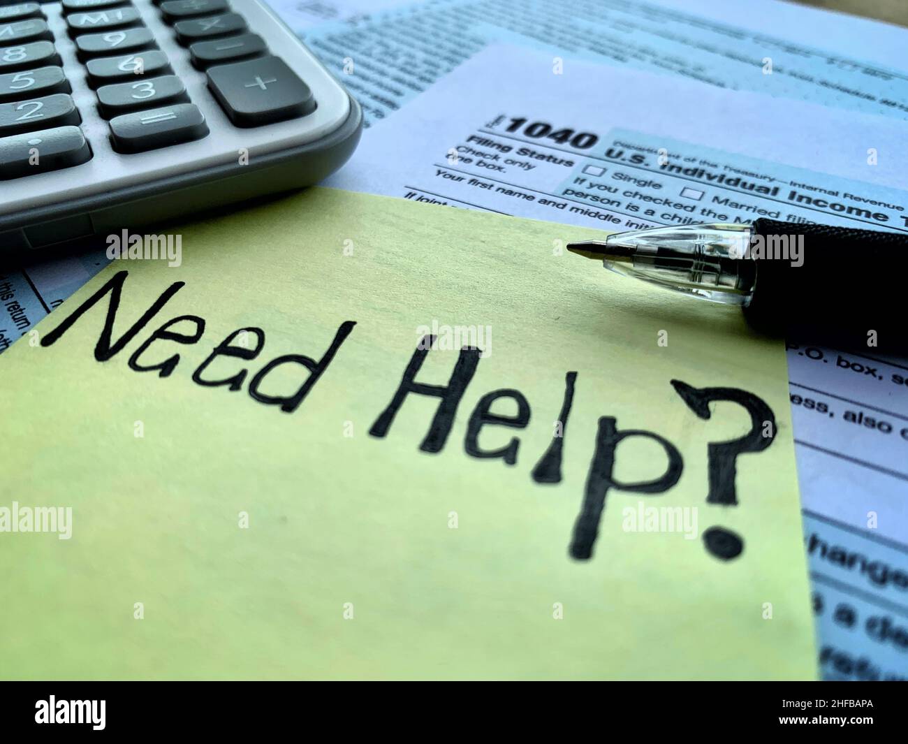 Need help text on stickers with tax forms. Assistance with filing up