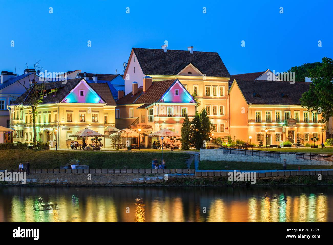 Night view of The Trinity Hill is oldest surviving district of Minsk - Trojeckaje Pradmiescie. Building In Old Part Minsk, Downtown Nyamiha, Nemiga Stock Photo