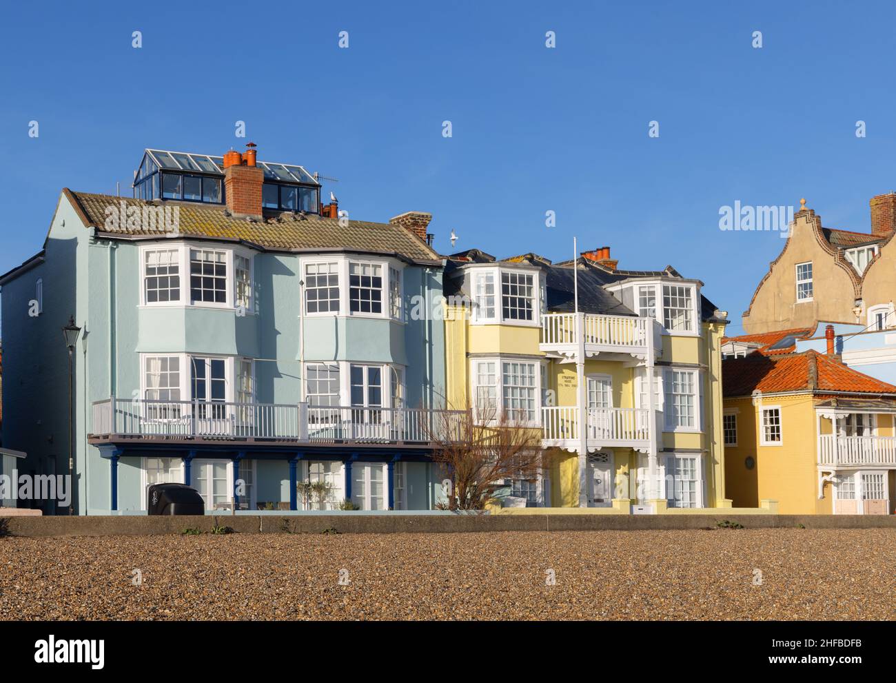 View of the colourful buildings on Crag Path facing the seafront in Aldeburgh. UK Stock Photo