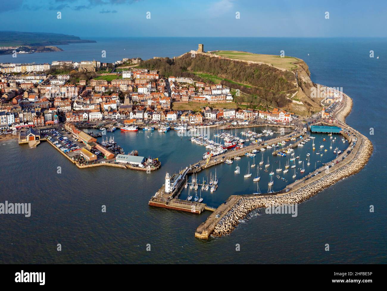 Aerial Image of Scarborough on New Years Day just before Sunset at High Tide. 1st January 2022 Stock Photo