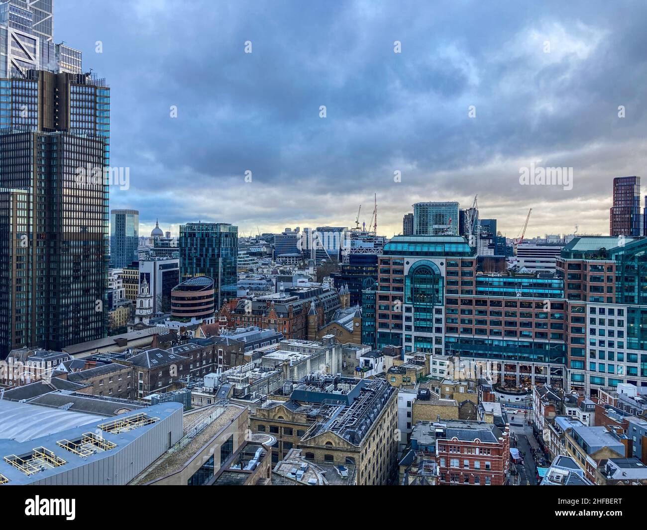 London, England, semi-aerial view from a tower block in Spitalfields, overlooking Middlesex Street with market stalls, and city offices Stock Photo