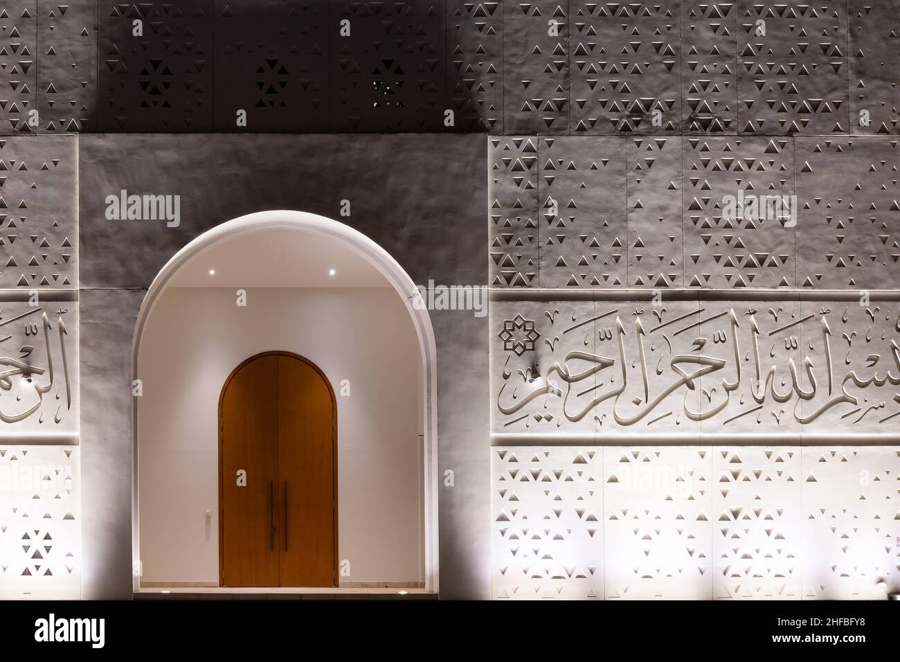 Dubai, UAE, 24.09.2021. Illuminated entrance doors and facade of white