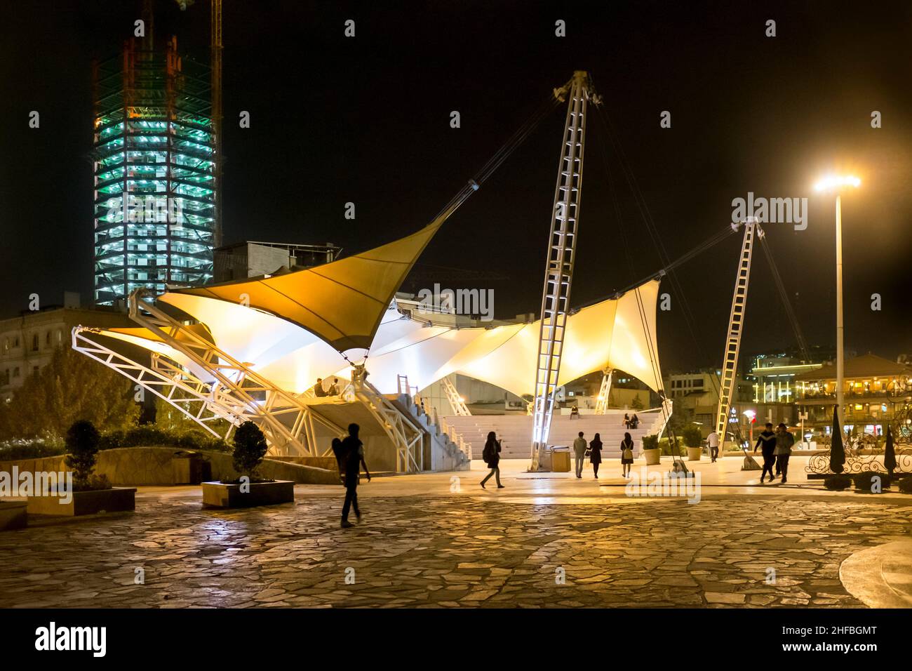tourists-and-locals-wandering-through-the-amphitheatre-at-ab-o-atash