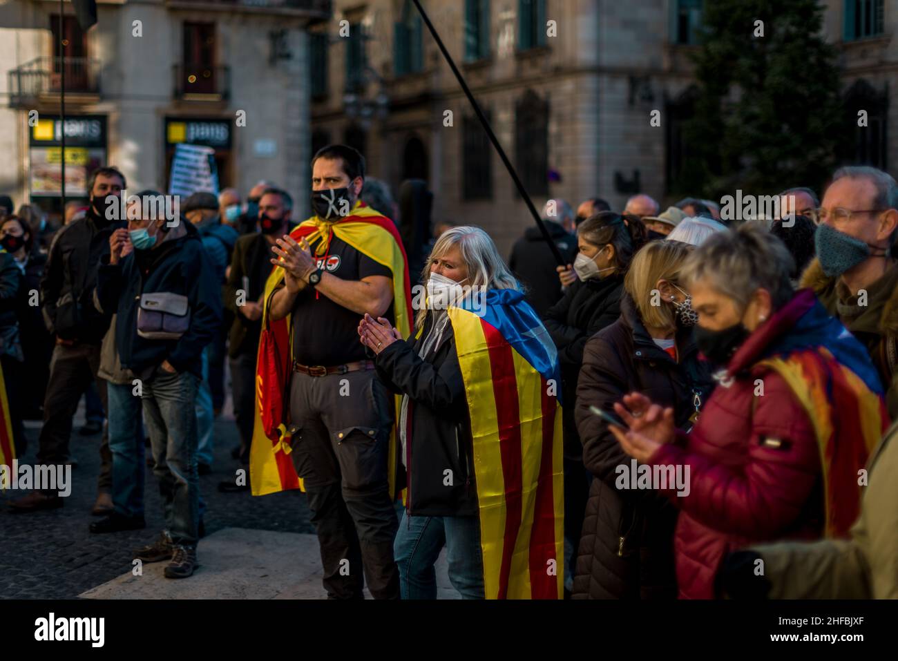 Barcelona, Spain. 15th Jan, 2022. Catalan separatists protest in front of the Catalan government after former police inspector Jose Manual Villarejo linked Spain's intelligence agency CNI with the 2017 jihadist terrorist attacks in Barcelona and Cambrils during a hearing at Spain's highest criminal court, where he faces charges including bribery, forgery, extortion, and influence peddling. Credit: Matthias Oesterle/Alamy Live News Stock Photo