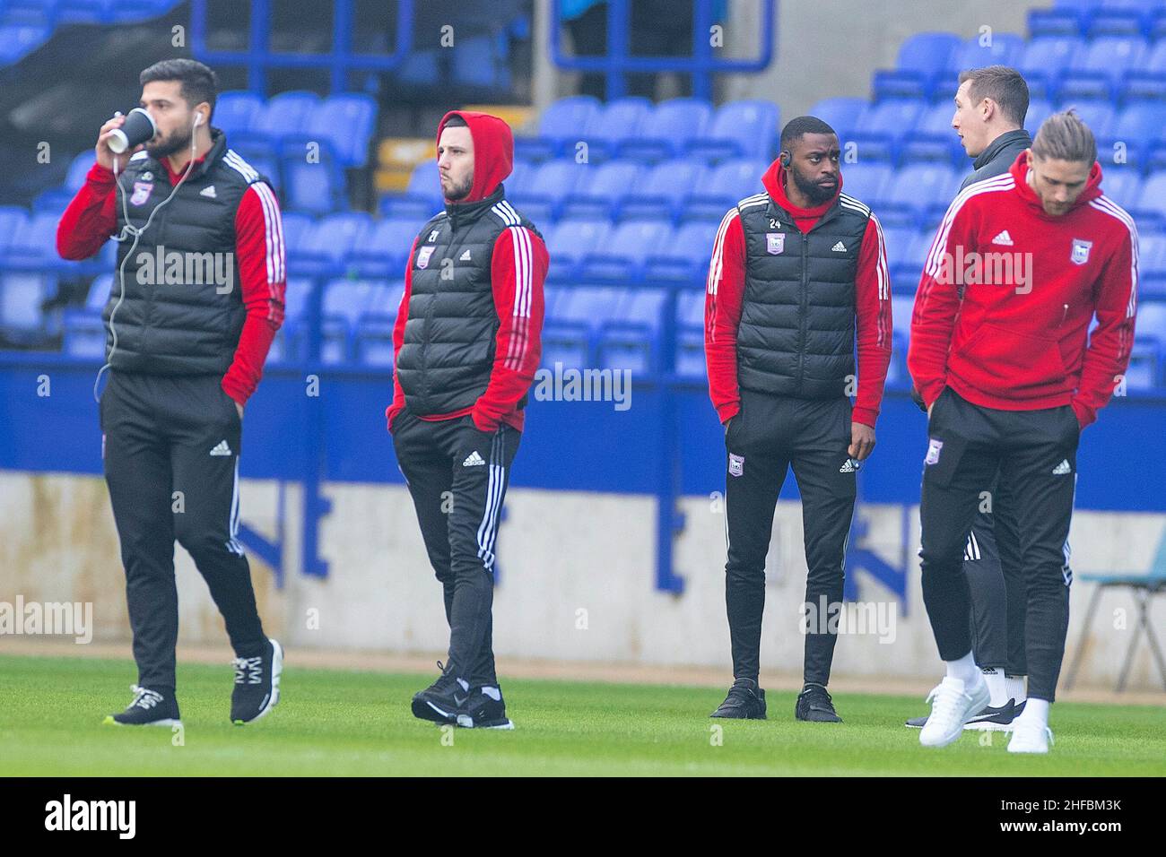 Bolton, UK. 15th Jan, 2022. Ipswich Town players inspect the pitch