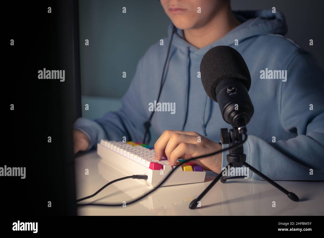 Video game streamers playing on their home console. Teenager playing