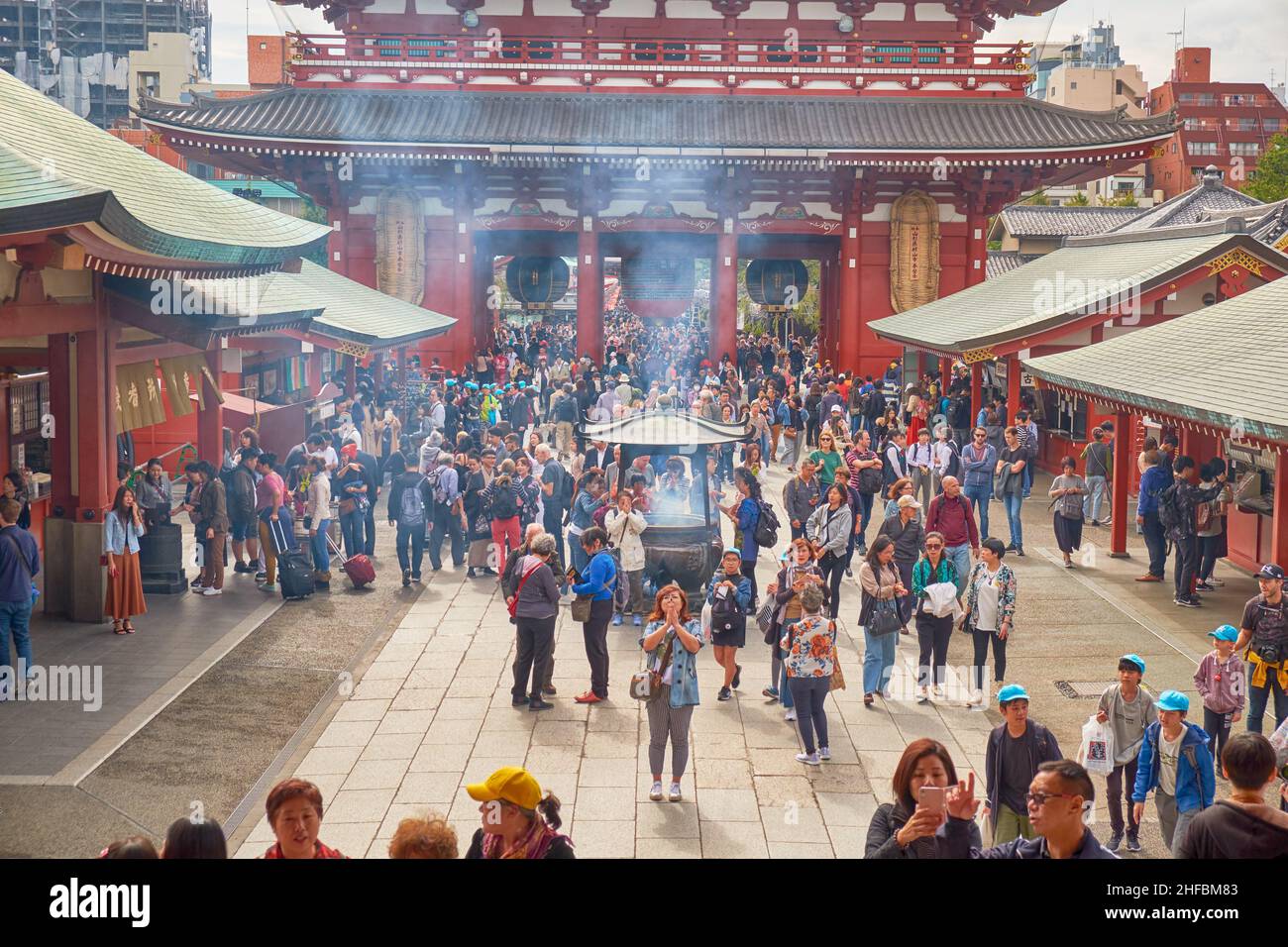 Tokyo, Japan - October 24, 2019: The territory of the oldest Buddhist temple Sensoji always full of people. The view from the main hall. Asakusa. Toky Stock Photo